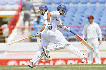 Mohammad Kaif and Rahul Dravid take a run on the second day of the second Test against the West Indies in St Lucia on Sunday.