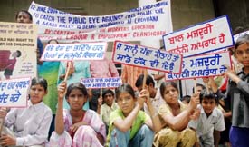 Children participate in a rally against child labour outside the DC’s office in Ludhiana on Monday