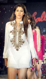 A model showcases a creation by Rakesh Verma at a fashion show in Ahmedabad