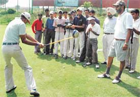 Caddies at a special coaching camp at the CGA Golf Range in Chandigarh 