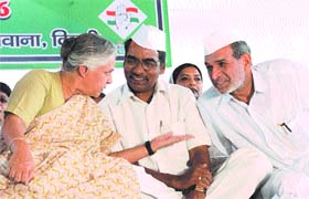 Delhi Chief Minister Sheila Dikshit and MP Sajjan Kumar at a training camp for Congress workers at Bawana in the Capital