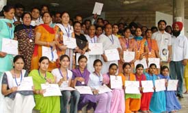 The participants who took Civil Defence training, after being honoured at Bacchat Bhawan in Ludhiana on Thursday