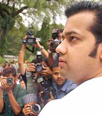 Rahul Mahajan addresses a press conference at his house in New Delhi on Thursday. 