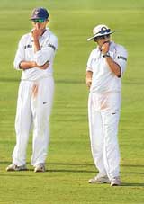 Rahul Dravid and Virender Sehwag look despondent as the last over is bowled on the final day of the second Test against the West Indies at the Beausejour stadium 