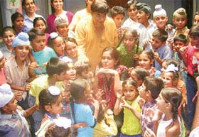 Theatre activists Gick Grewal and Ravinder Happy with tiny tots at Mohali