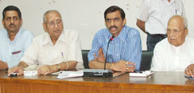 BJP state secretary Anil Sarin flanked by Lala Lajpat Rai on his left and Mr Satpal Gosain addressing a press conference in Ludhiana on Friday