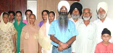 Family members of the stranded youths in Jalandhar on Sunday.