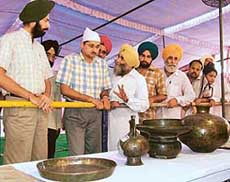 The utensils, which belonged to Guru Gobind Singh, on display at an exhibition during the tercentenary celebrations in Bathinda on Sunday.