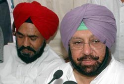 Chief Minister Amarinder Singh talks to mediapersons at Banga in Nawanshahr district on Monday. PPCC chief Shamsher Singh Dullo accompanies the Chief Minister. 