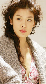 Model Gaile Lai poses at a promotional event for a boutique in Hong Kong