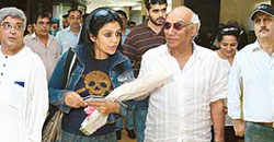 Bollywood director Yash Chopra (second from right) arrives at Hotel Taj before the Punjab Rattan Award ceremony in Chandigarh on Tuesday. He is accompanied by Javed Akhtar (left), Mandira Bedi and Anupam Kher.