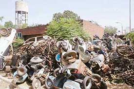 Goods which are to be auctioned lie outside the judicial malkhana in Ludhiana on Tuesday. 