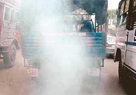 WHO WILL CHALLAN THIS VEHICLE? A police van billows thick smoke, which seems to challenge traffic rules in Ludhiana on Tuesday. 