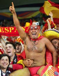 Spanish fans celebrate their teams victory in a Group H match between Spain and Tunisia in Stuttgart on Monday. Spain won 3-1. 