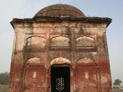 A view of a temple in Pul Kanjri that is in ruins. The inner walls of the temple