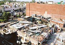 The rooftop of the dhaba sites in Sector 22 shows haphazardly constructed rooms. 