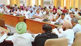 Mr Lal Singh chairing a meeting of the District Planning and Development Board (DPDB) in Ludhiana on Wednesday. 