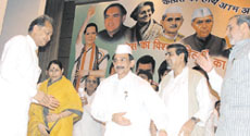 Congress leader Ashok Gehlot being welcomed by DPCC chief Ram Babu Sharma and party MPs Krishna Teerath, Jagdish Tytler and Sajjan Kumar on the occasion of a training camp 