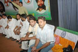 The National flag takes a back seat as All-India Youth Congress workers give more importance to matters other than the honour to the Tricolour at a party function 
