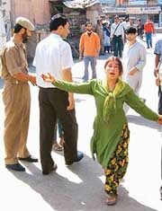 A grieving relative of an old woman who was killed in a grenade blast in Sopore on Thursday.