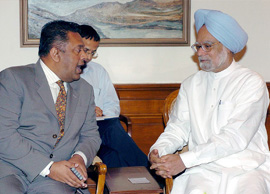 Prime Minister Manmohan Singh with Sri Lankan Foreign Minister Mangla Samarveera at a meeting in New Delhi on Thursday.
