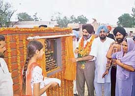 The PSIDC Vice-Chairman, Mr Deepinder Dhillon, inaugurates a road named after a martyr in Devi Nagar village in Patiala