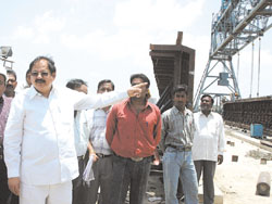 Delhi Urban Development Minister Dr A. K. Walia at the site of the bridge being constructed at Geeta Colony near Yamuna Pushta