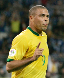 Brazils Ronaldo celebrates after scoring his teams first goal against Japan during their Group F match in Dortmund on Thursday