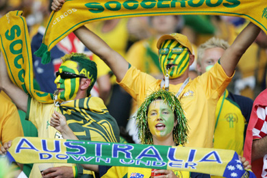 Australian fans celebrate after their team drew with Croatia in Stuttgart on Thursday to enter the second round