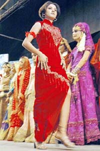 Pakistani models display bridal outfits at a fashion show organised by the Pakistan National Council of Arts in Karachi