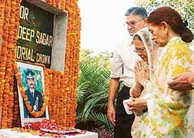 Parents of martyr Major Sandeep Sagar pay tribute to their son on his seventh death anniversary at his memorial in Panchkula on Sunday