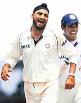 Harbhajan Singh and S. Sreesanth react after the former took the last West Indian first innings wicket of Corey Collymore on the third day of the third Test between West Indies and India in St Kitts on Saturday
