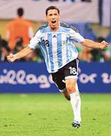 Argentinian midfielder Maxi Rodriguez celebrates after scoring a goal during extra time in the round of 16 match between Argentina and Mexico in Leipzig on Saturday