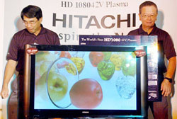 Mr Tadashi Nishiuchi, Managing Director, Hitachi Home Electronics Asia, and Mr K. Morita, Managing Director, Hitachi India, with the world's highest resolution 42-inch plasma television