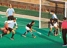 A hockey match in progress between the Multan Hockey Club, Pakistan, and Chandigarh Hockey XI, at the Hockey Stadium, Sector 42, Chandigarh, on Wednesday.