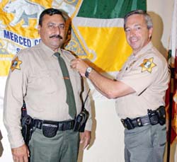 Tarlochan Singh Sohal  gets the Deputy Sheriff s badge from the Merced County Sheriff in California