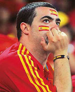 A dejected Spanish supporter after the end of the second round Spain vs France match in Hanover on Tuesday. 