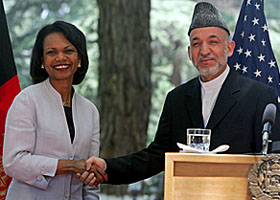 US Secretary of State Condoleezza Rice shakes hands with Afghan President Hamid Karzai in Kabul on Wednesday. 
