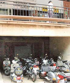 The underground parking lot in front of the Estate Office building which has been shut down for general parking