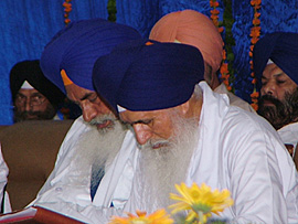 Akal Takht Jathedar Giani Joginder Singh Vedanti and Damdama Sahib Jathedar Balwant Singh Nandgarh take a nap during a seminar held to mark the 400th anniversary celebrations of the foundation of Akal Takht at Khalsa College in Amritsar on Friday.