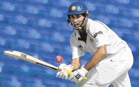 With his place in the team under threat, VVS Laxman came up with a fighting century in the St Kitts Test