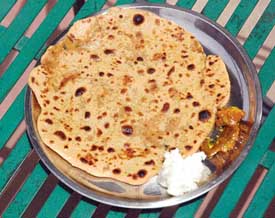 Paranthas with home-made butter still top the breakfast list for many. 