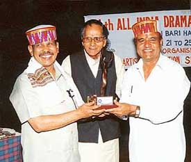 Madhav Kaushik being awarded at a function in Shimla.
