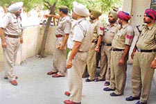 Mr Raghbir Singh Sandhu, DSP, Dakha, takes stock of the situation in Latala village where two persons were injured in a group clash on Saturday