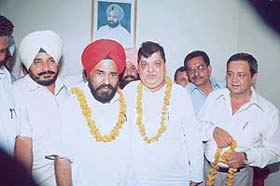 Mr Joginder Singla, newly appointed treasurer of the Punjab Pradesh Congress Committee (PPCC), with PPCC president Shamsher Singh Dullo