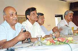 Mr J.K. Gupta addresses a seminar on issues and options concerning the Union Territory's periphery at Sector 24, in Chandigarh on Sunday