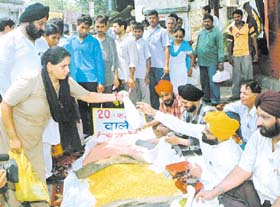 Consumers making a long queue to purchase pulses at Gole Market in the Capital