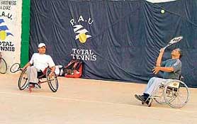 Players in action during the inaugural All-India Wheelchair Tennis Tournament being organised by the Total Tennis Academy on the PAU campus, Ludhiana, on Sunday. 