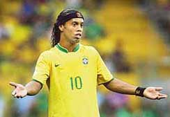 Brazilian midfielder Ronaldinho reacts at the end of the quarterfinal match against France in Frankfurt on Saturday.