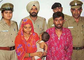 Sunil Kumar, accused of kidnapping and raping a minor, in police custody, along with his wife and daughter, in Chandigarh